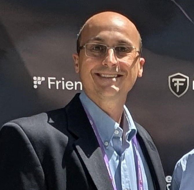 Matt Phillips smiling at GenAI Week Silicon Valley 2025.
